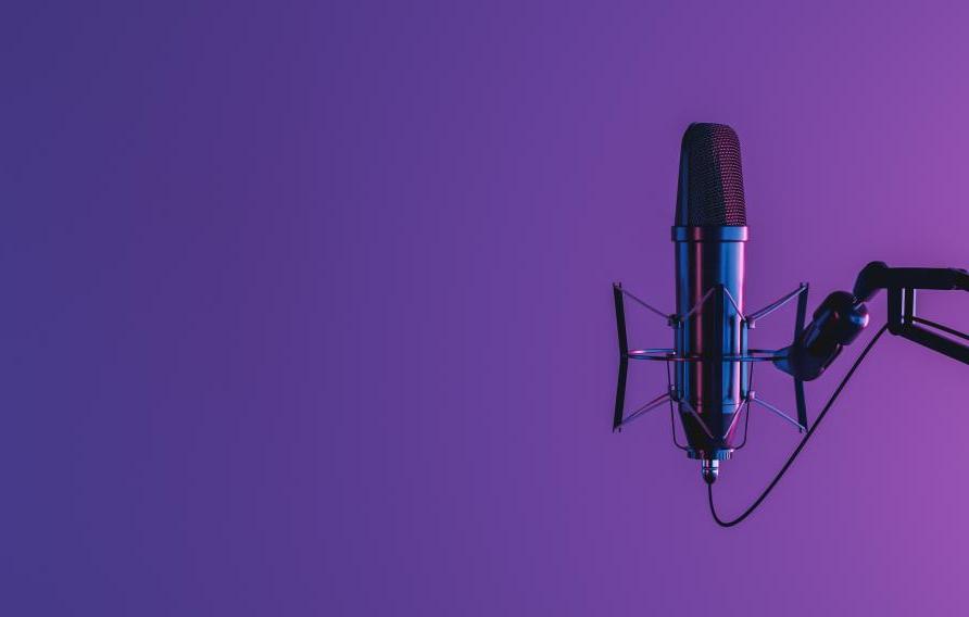 microphone in front of purple background